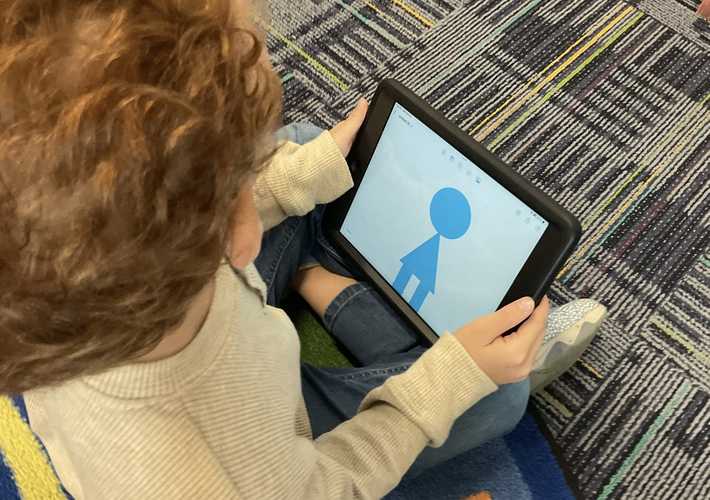 Student using Freeform creating shapes Student using Freeform creating shapes